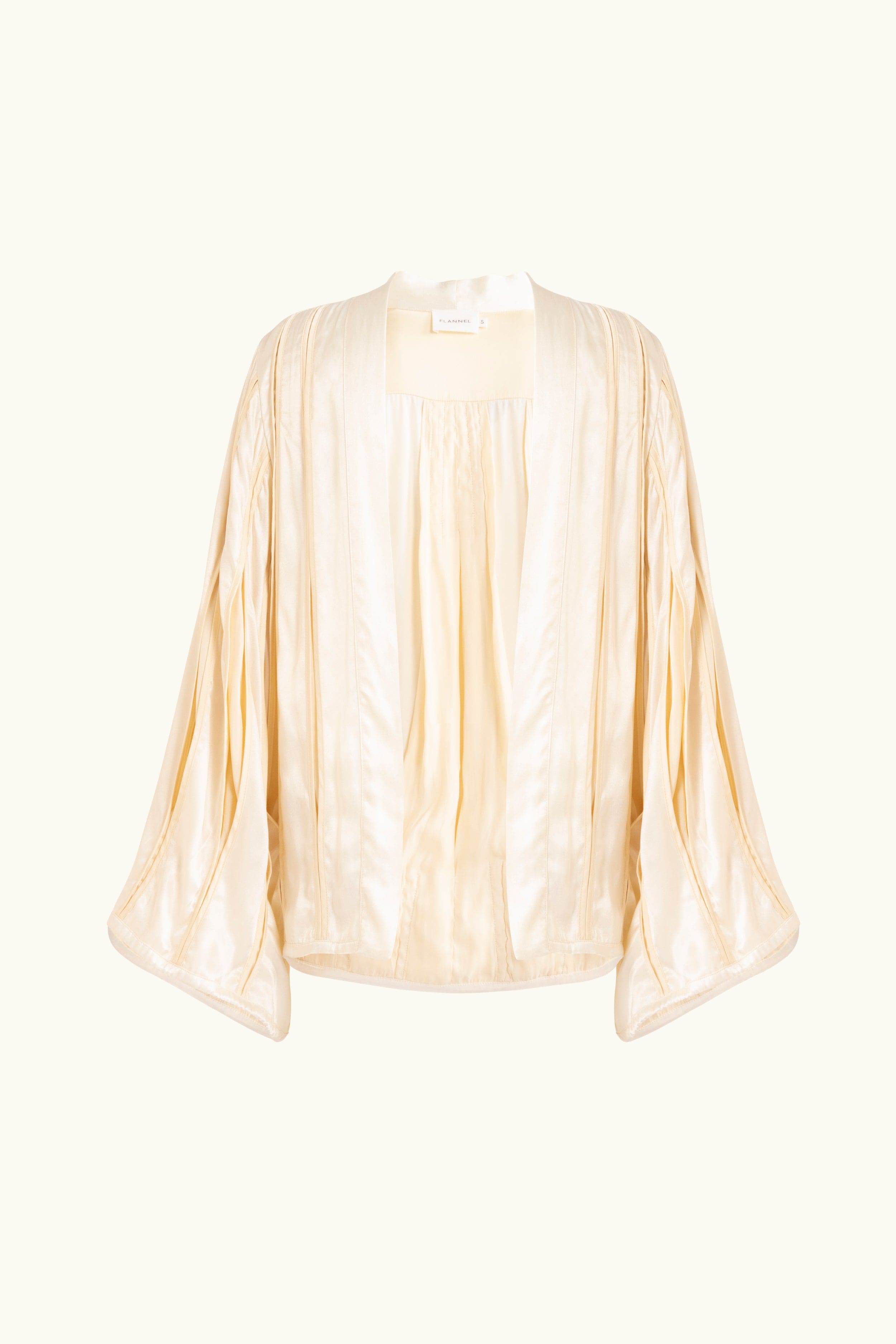Cream box pleat jacket on white background