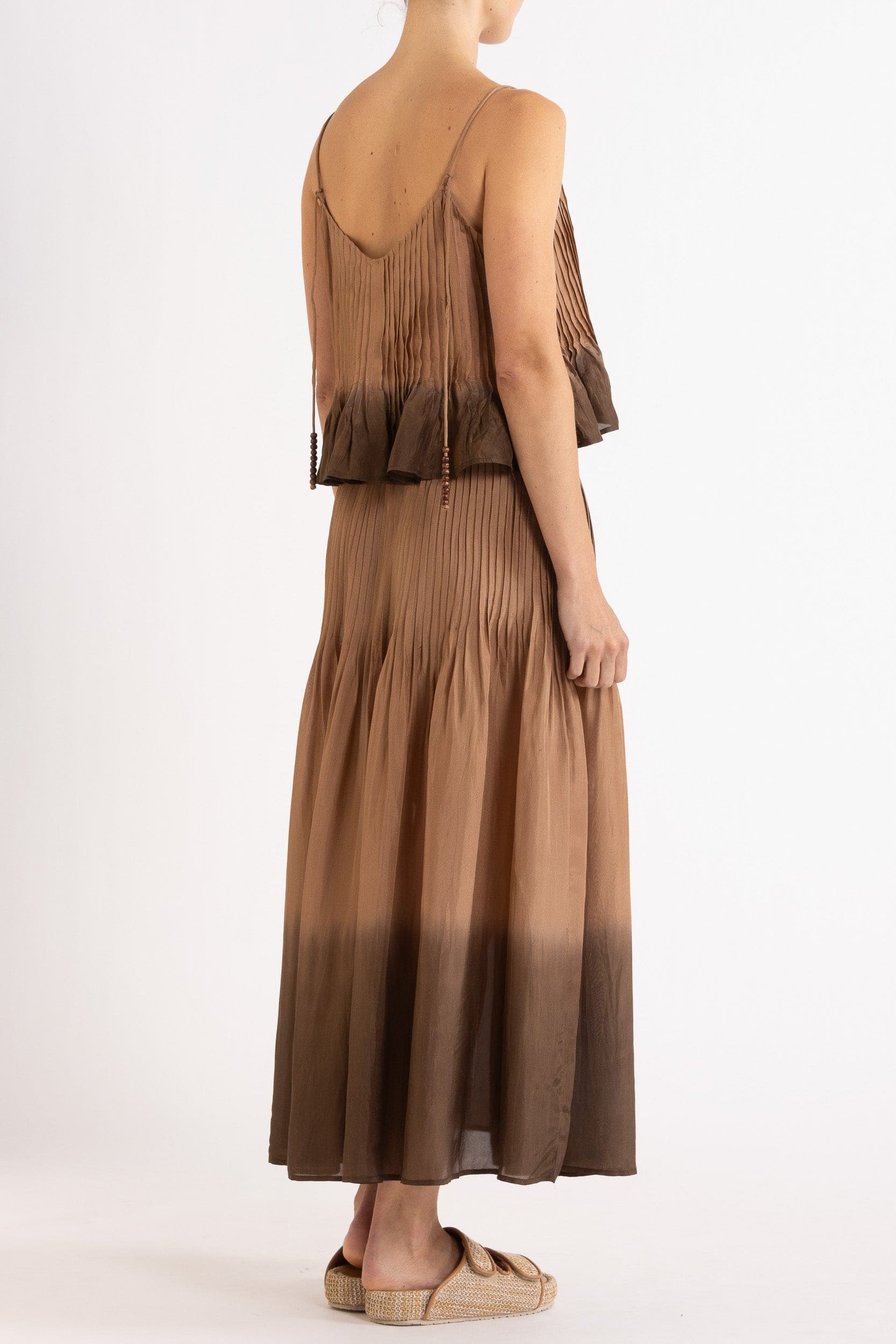 Model wearing mocha dip-dye silk cami & skirt, back-side view