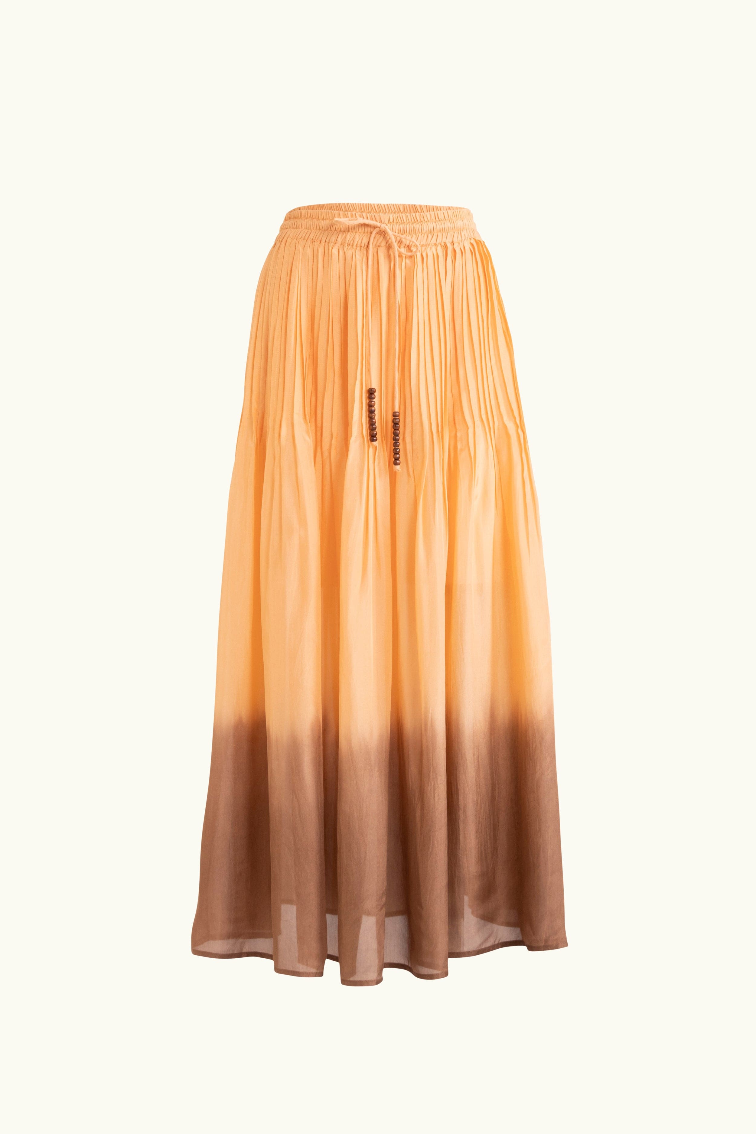 Peach dip-dye silk skirt on a white background