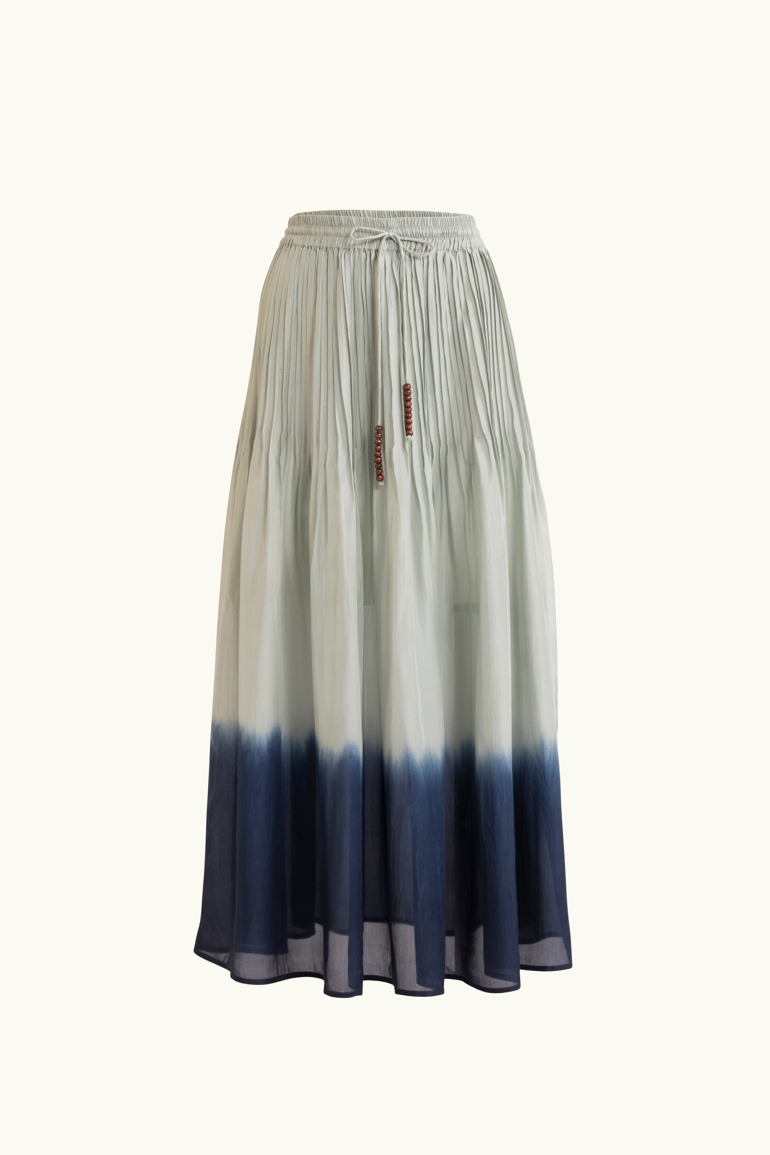 Sky blue dip-dye silk skirt on a white background