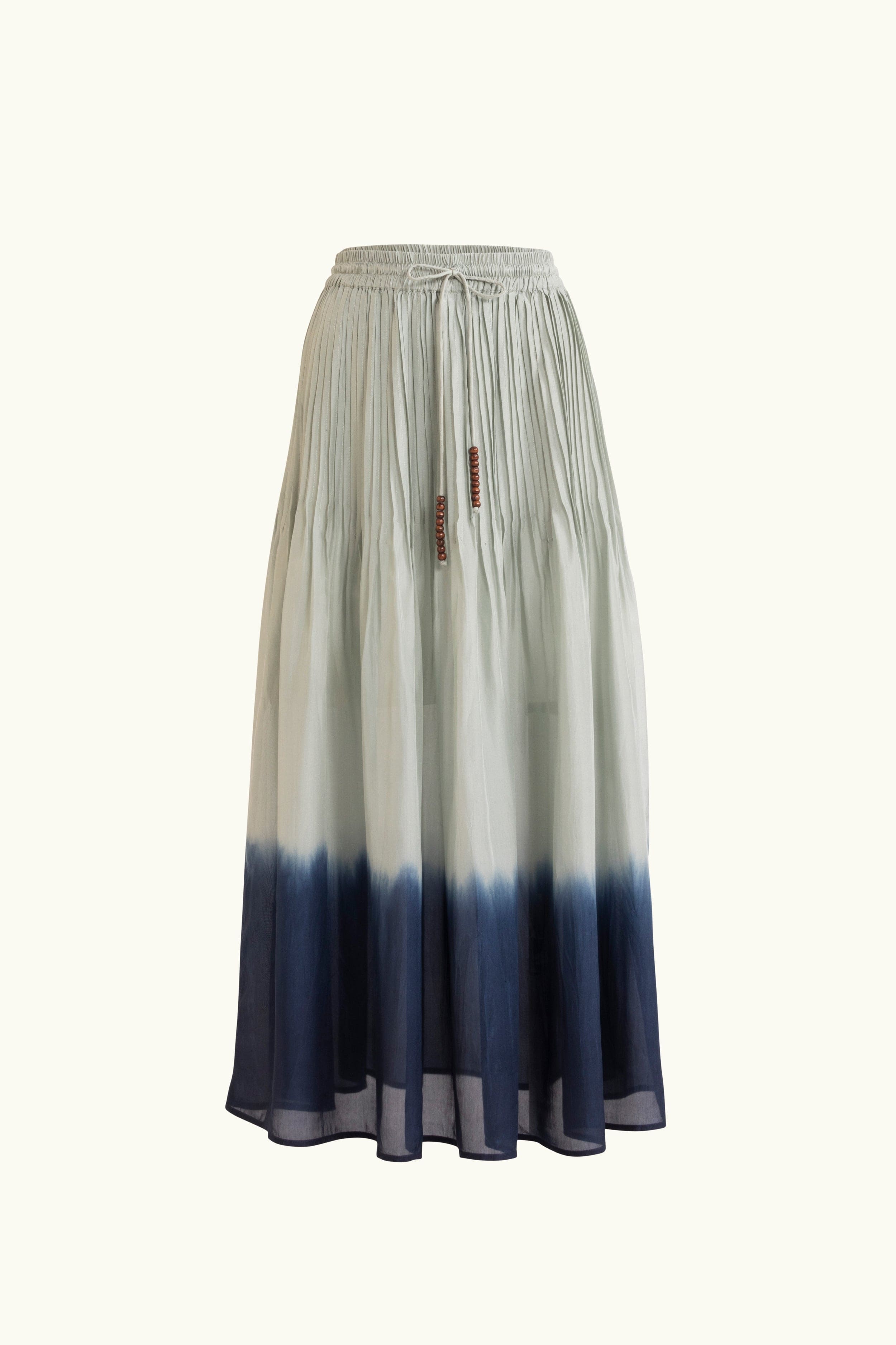 Sky blue dip-dye silk skirt on a white background