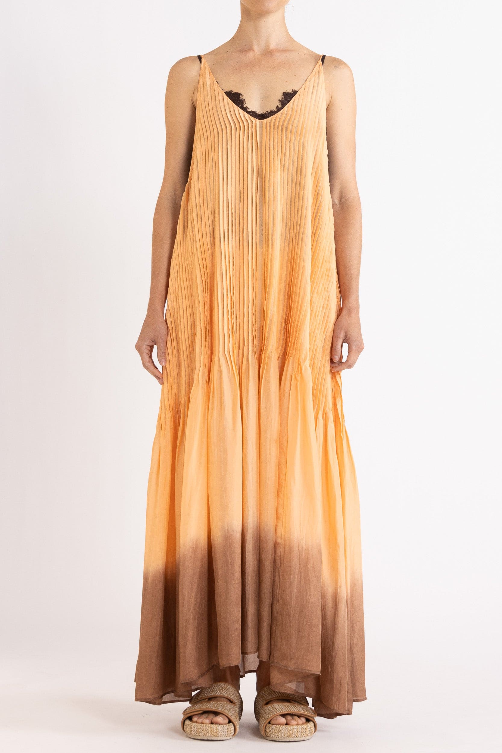 Model wearing peach dip-dye silk cami dress, front view