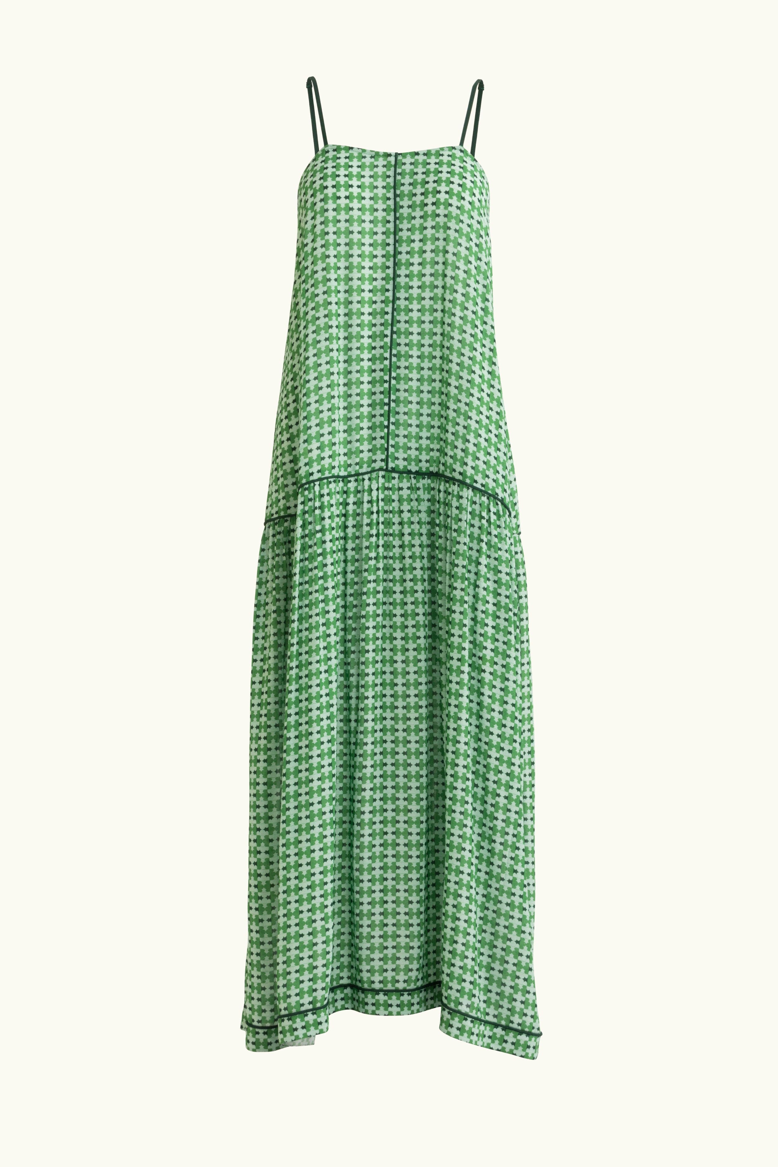 Green patterned dress on a white background