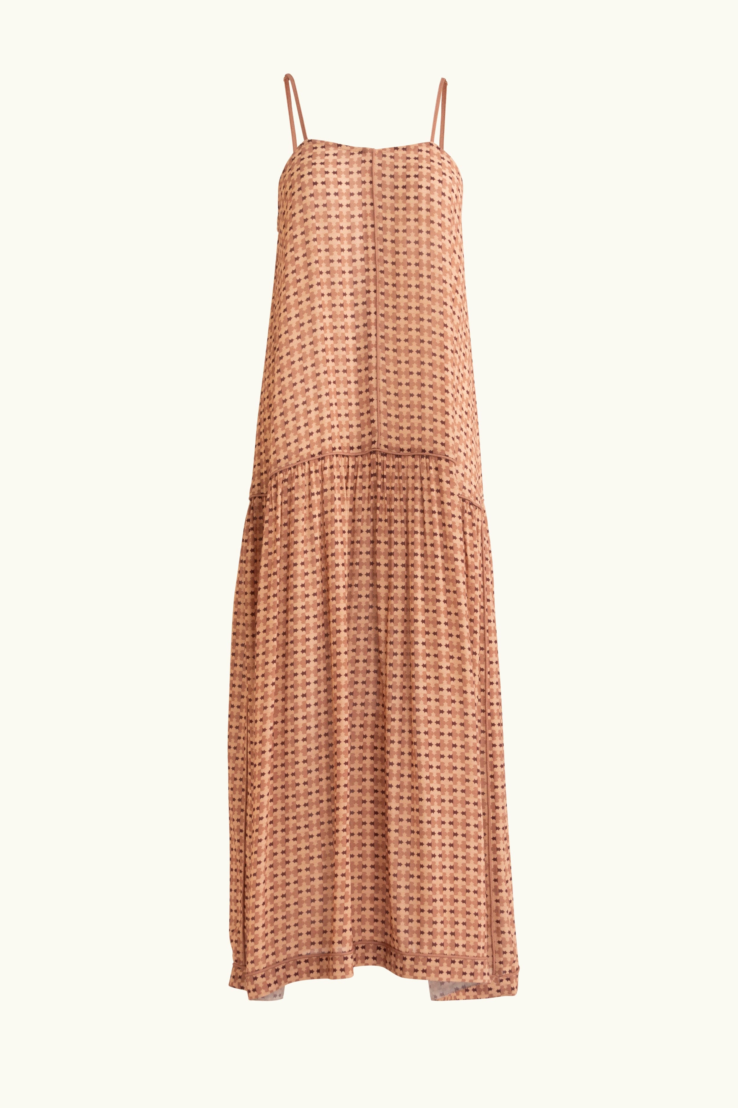 Peach patterned dress on a white background