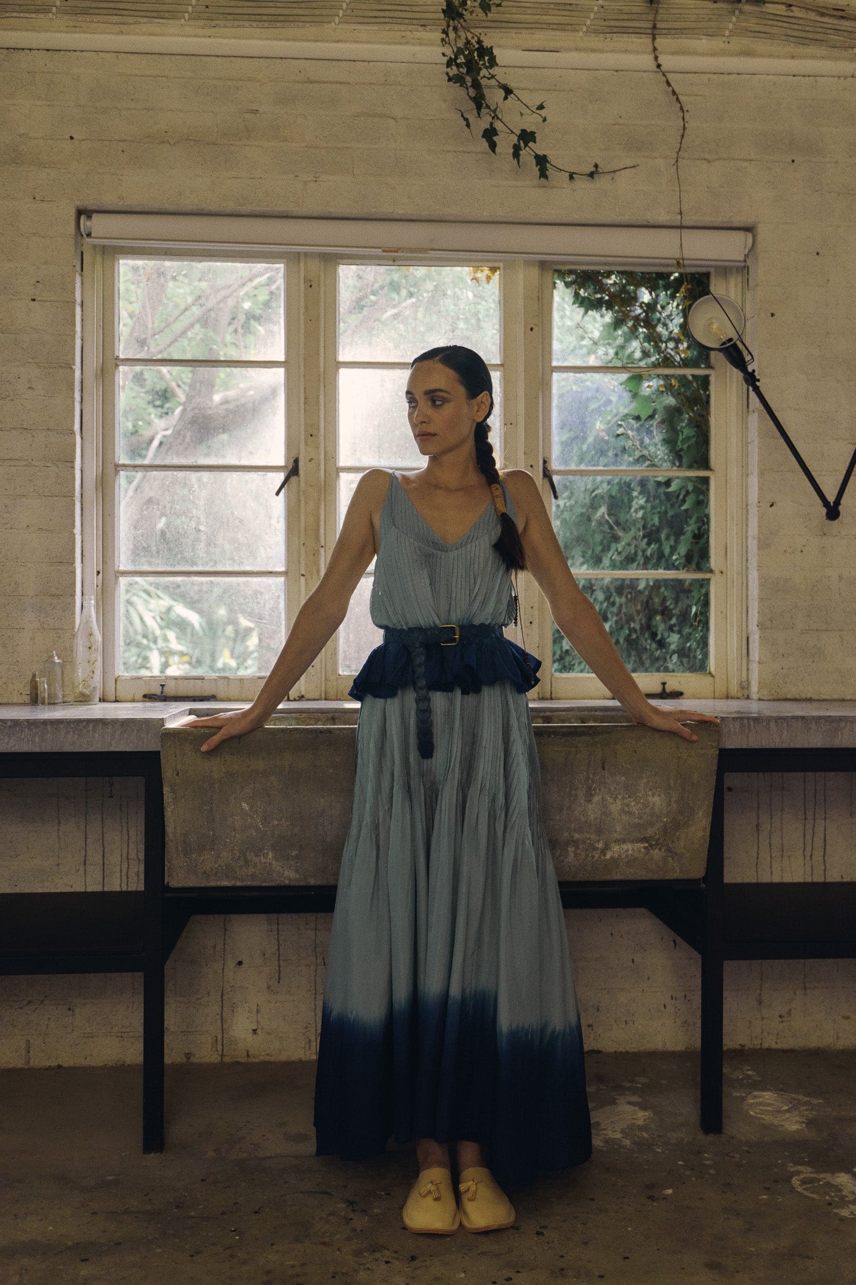 Model wearing sky blue dip-dye silk cami & dress, campaign image