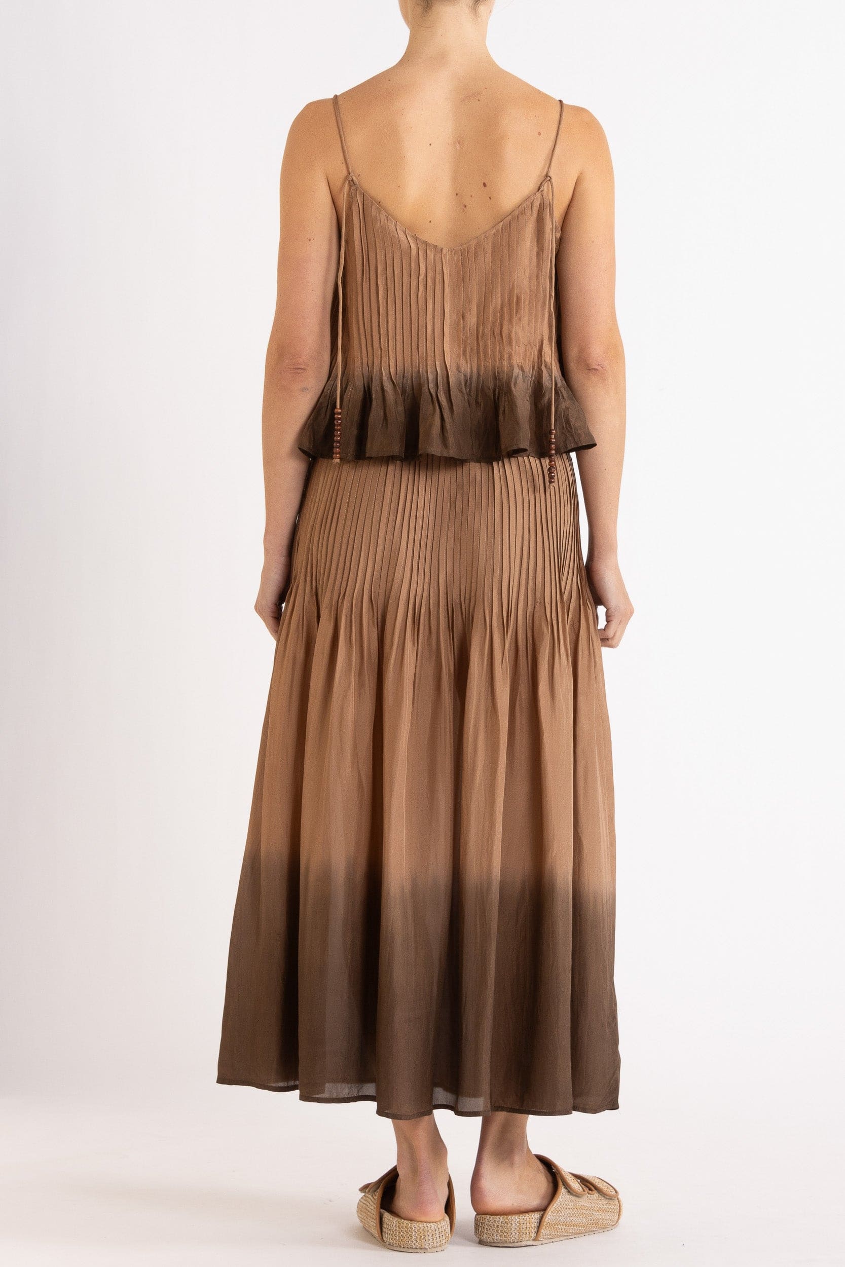 Model wearing mocha dip-dye silk cami & skirt, back view