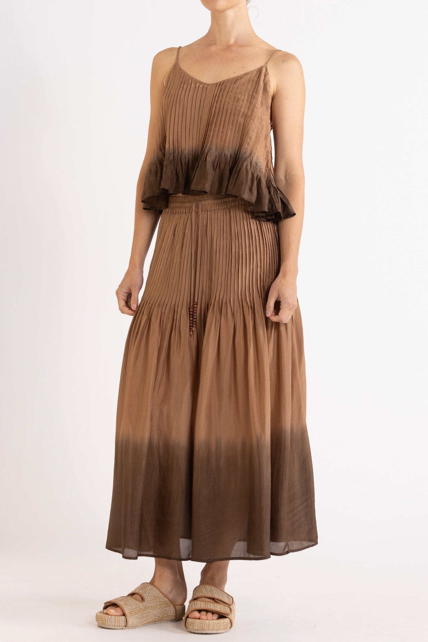 Model wearing mocha dip-dye silk cami & skirt, front-side view