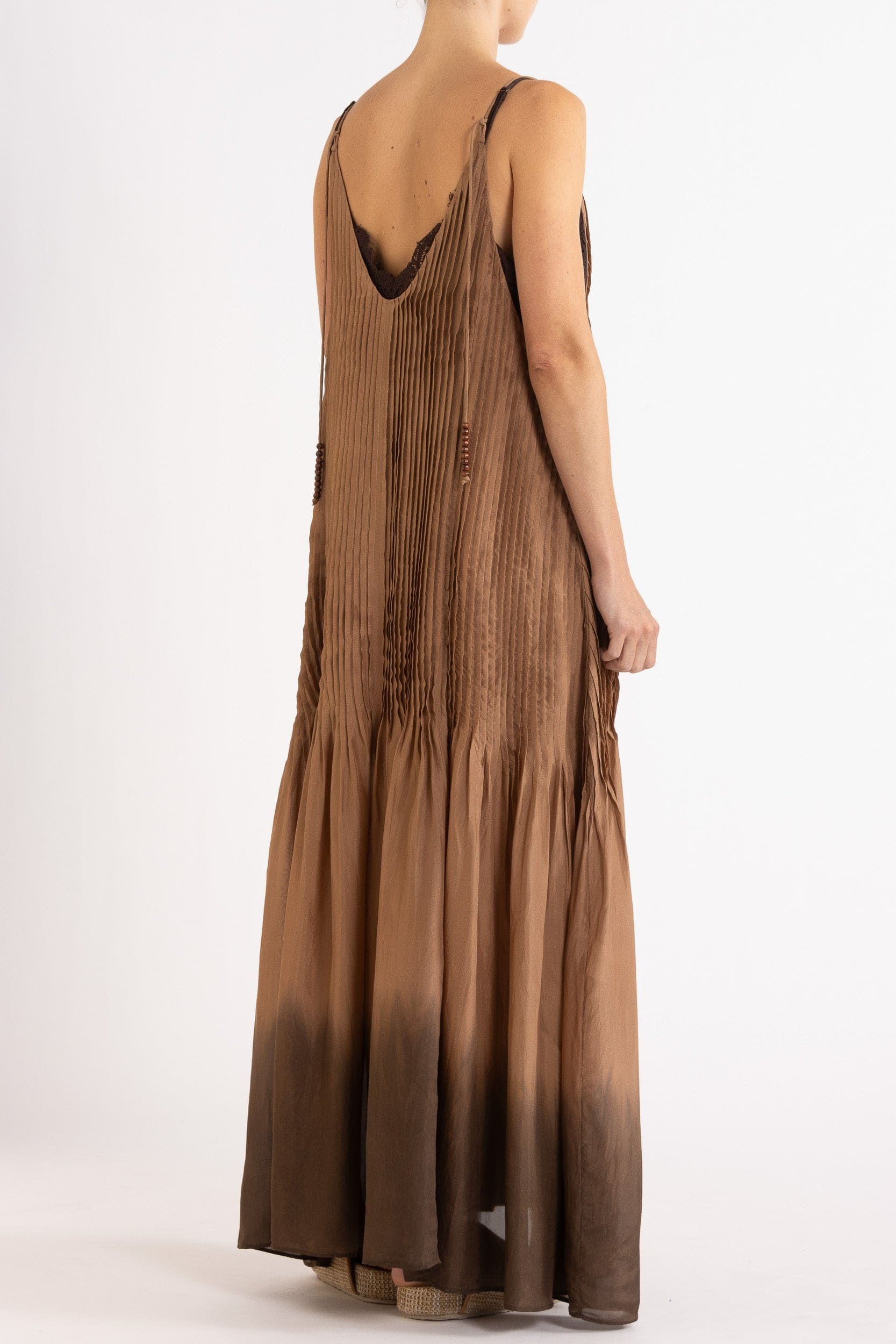 Model wearing mocha dip-dye silk cami dress, back-side view