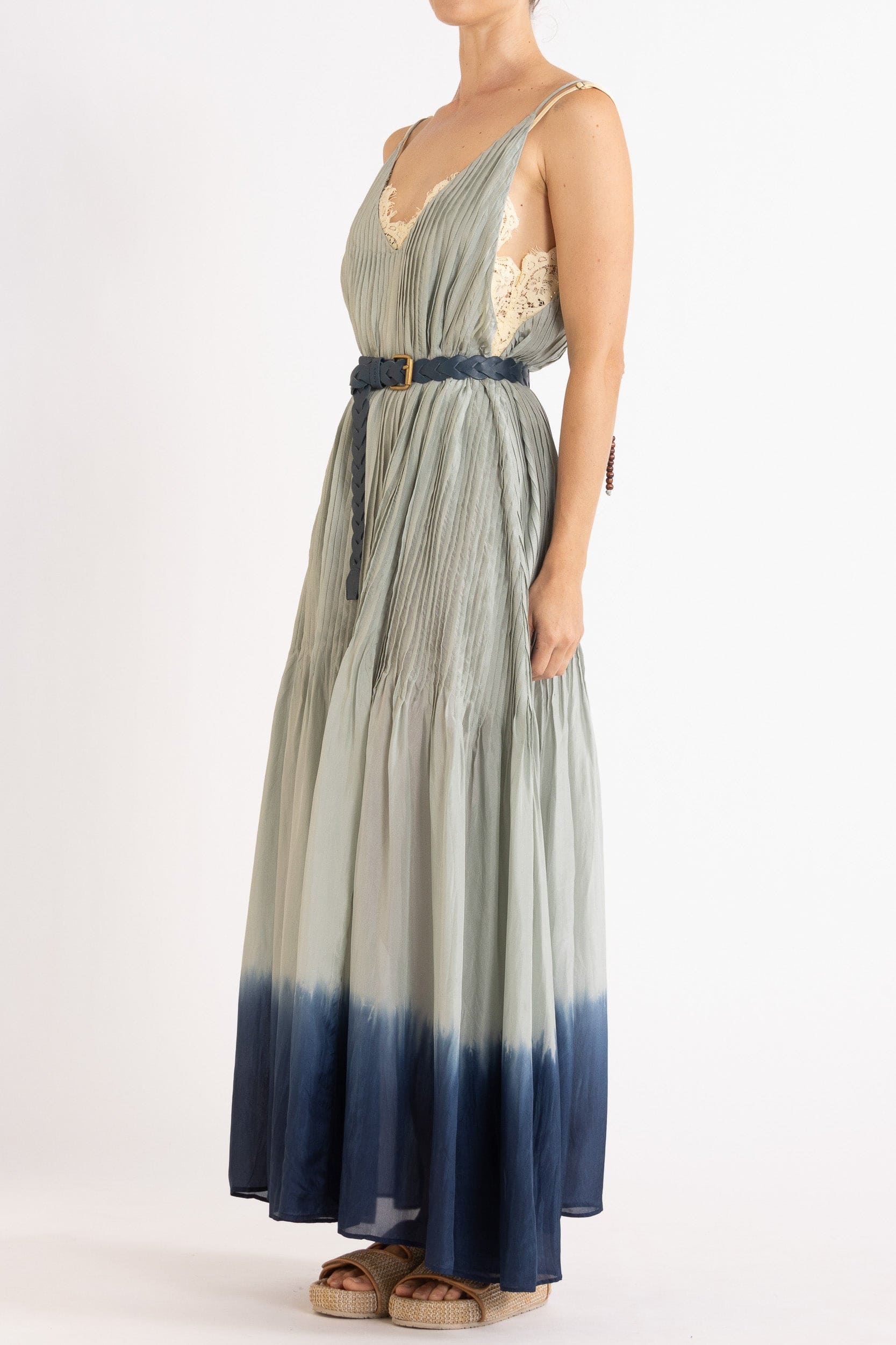Model wearing sky blue dip-dye silk cami dress & belt, side view